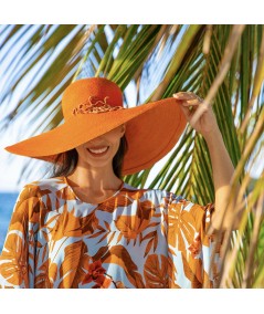 Carolyn Carter wearing our Coral on the Riviera