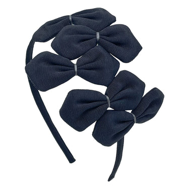 A black grosgrain headband adorned with multiple bows with gray stitching on a white background.