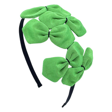 A green grosgrain headband adorned with multiple bows with black stitching 